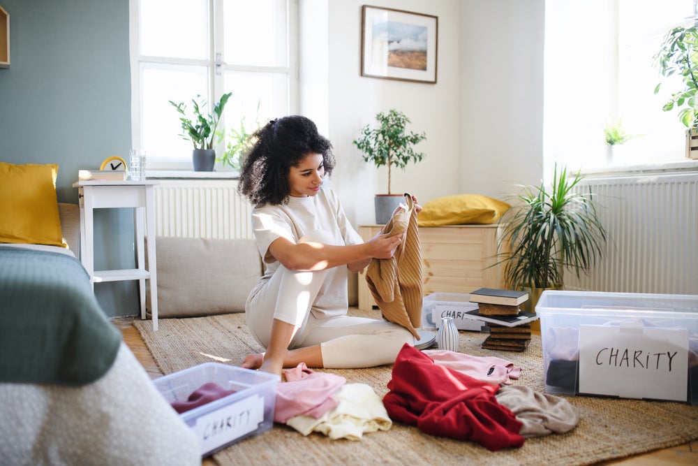 Woman sorting through clutter