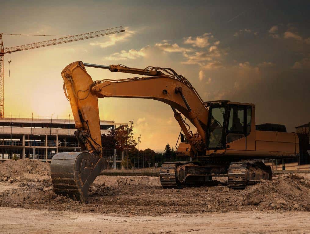 Tractor breaking ground on new building