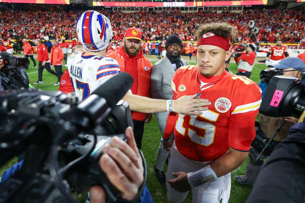 Patrick Mahomes #15 of the Kansas City Chiefs reacts with Josh Allen #17 of the Buffalo Bills