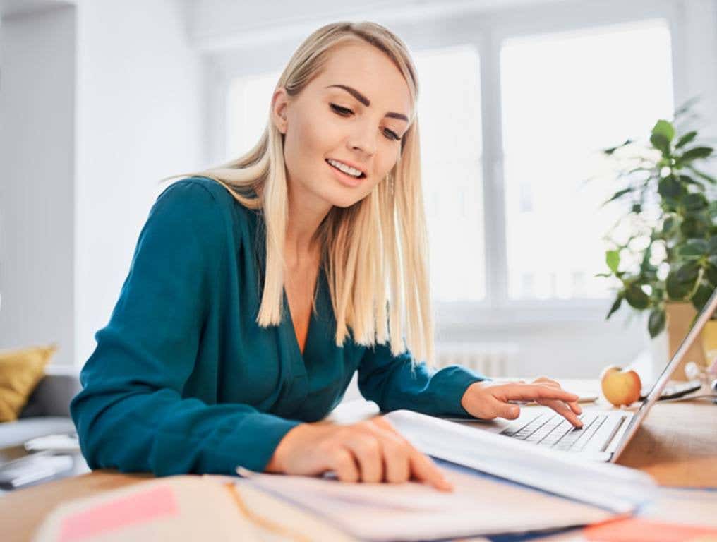 Businesswoman working from home office.