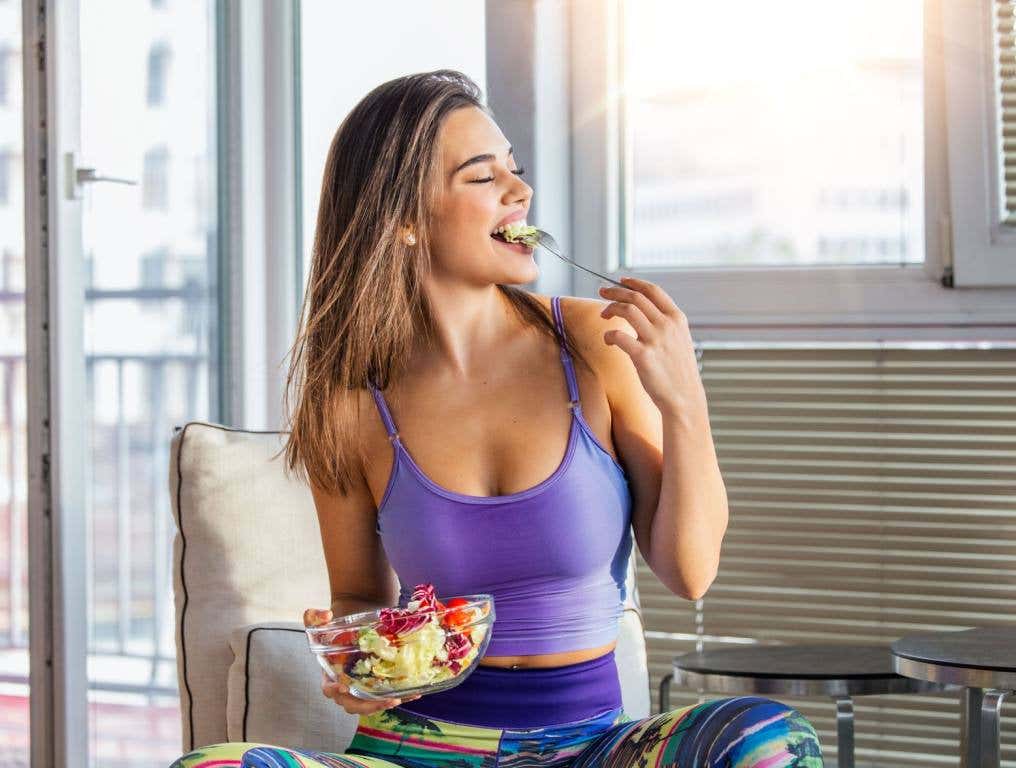 Woman eating and working out. This important nutrient could help you lose weight, and it's easy to add more of it to your diet.