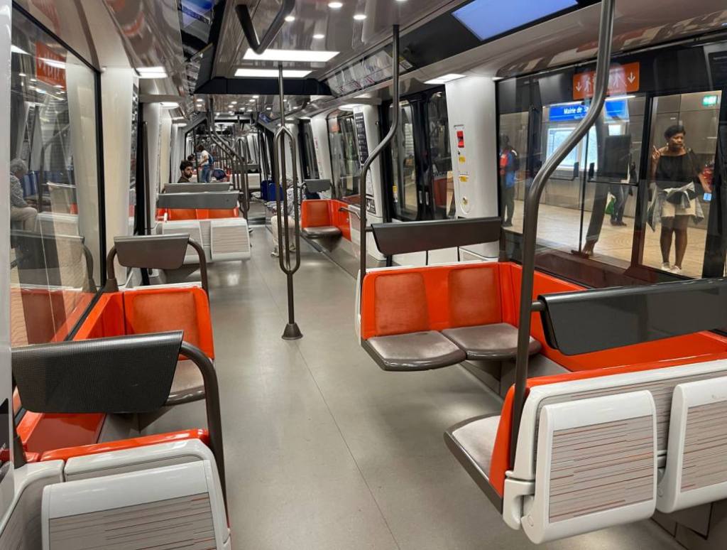 an empty subway car in Paris during the Olympics 
