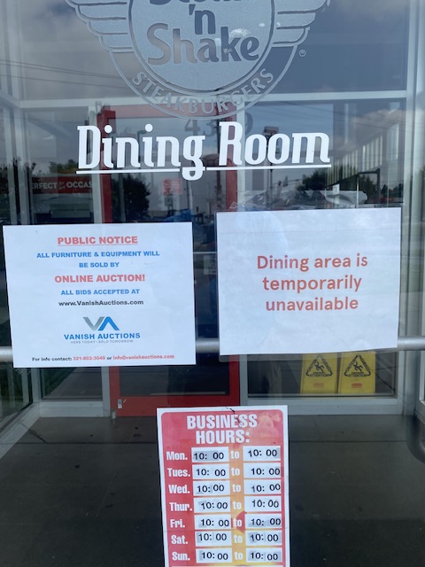 Photo of two signs on the Steak n' Shake in Augusta